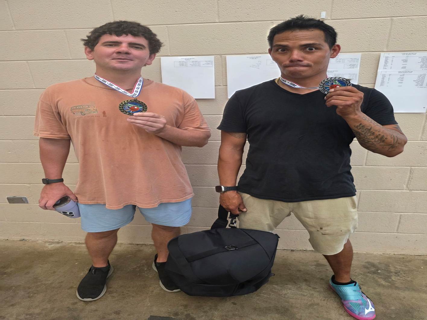 Two men standing next to each other

AI-generated content may be incorrect.