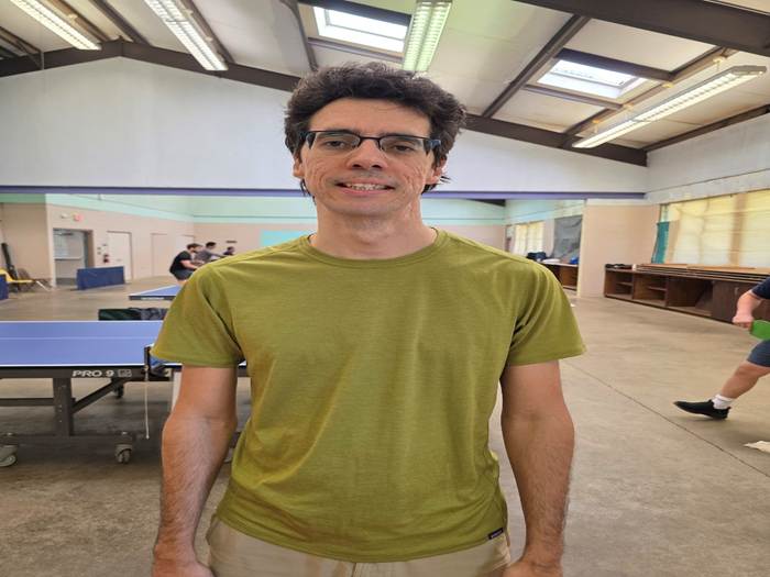 A person in a green shirt

AI-generated content may be incorrect.