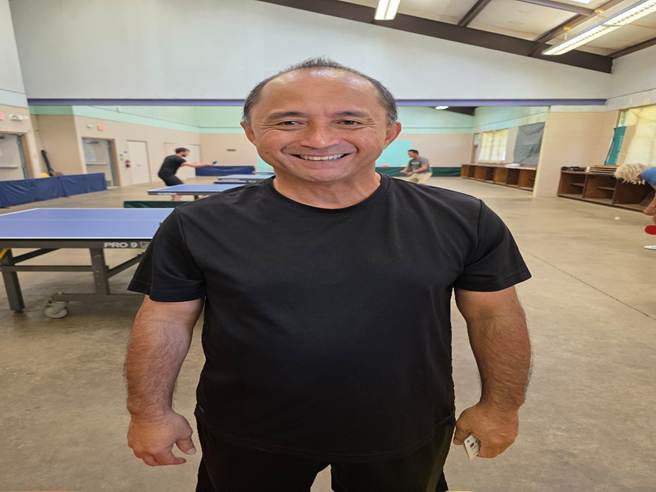 A person in a black shirt

AI-generated content may be incorrect.